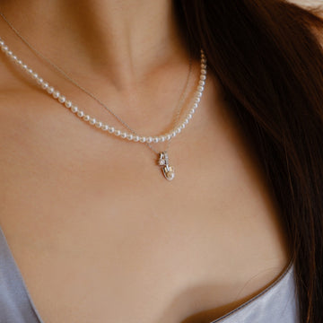 Akoya Pearl Spade Pendant Necklace front view featuring Akoya pearl and gold-plated silver by S.Journee