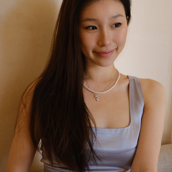 Akoya Pearl Spade Pendant Necklace styled view featuring Akoya pearl and gold-plated silver by S.Journee